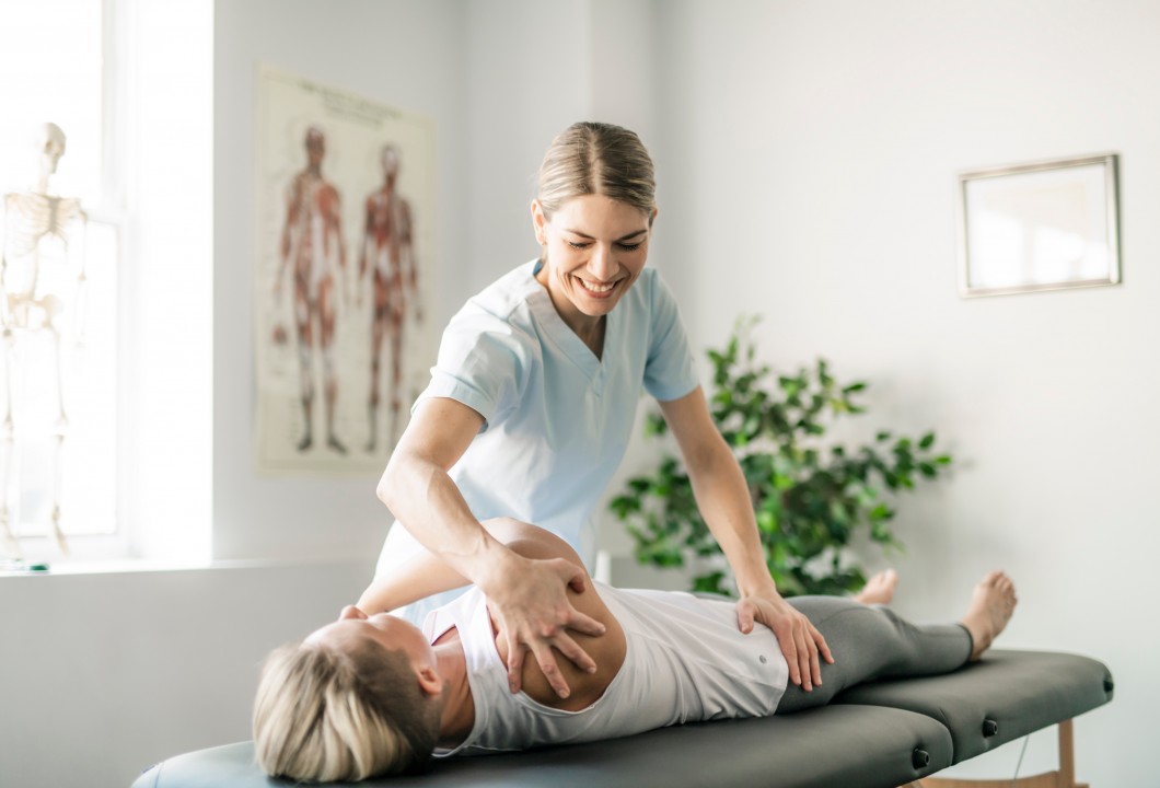 Woman performing chiro treatment